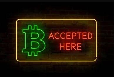 A gift of bitcoin storefront neon sign